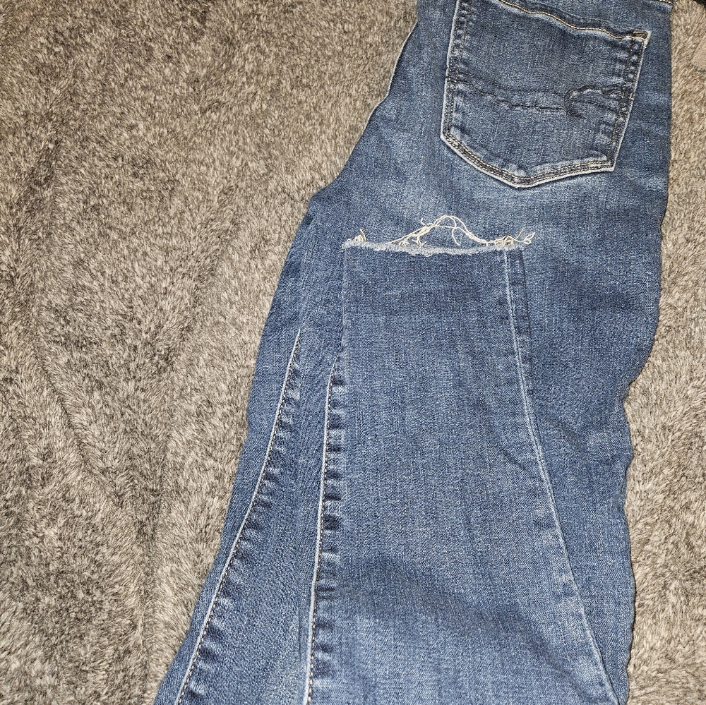 Super High Rise American Eagle Jeggings, freyed ankle  dark Blue rinse size 10